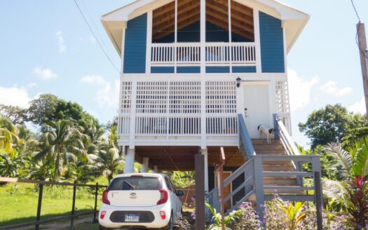 The Blue House in Sandy Bay Beach Roatan Island